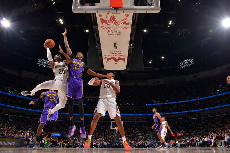 NEW ORLEANS, LA - NOVEMBER 16: Jaylen Nowell #20 of the New Orleans Pelicans drives to the basket during the game against the Los Angeles Lakers on November 16, 2024 at the Smoothie King Center in New Orleans, Louisiana. NOTE TO USER: User expressly acknowledges and agrees that, by downloading and or using this Photograph, user is consenting to the terms and conditions of the Getty Images License Agreement. Mandatory Copyright Notice: Copyright 2024 NBAE (Photo by Jesse D. Garrabrant/NBAE via Getty Images)