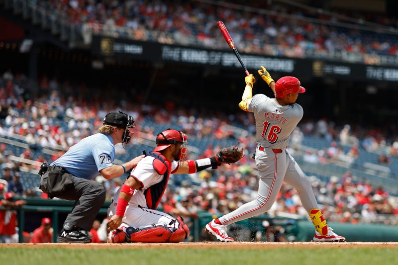 Jul 21, 2024; Washington, District of Columbia, USA; Cincinnati Reds third baseman Noelvi Marte (16) hits a solo home run against the Washington Nationals during the second inning at Nationals Park. Mandatory Credit: Geoff Burke-USA TODAY Sports