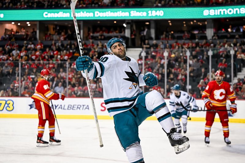 Feb 15, 2024; Calgary, Alberta, CAN; San Jose Sharks right wing Justin Bailey (90) celebrates after scoring a goal against the Calgary Flames during the second period at Scotiabank Saddledome. Mandatory Credit: Brett Holmes-USA TODAY Sports