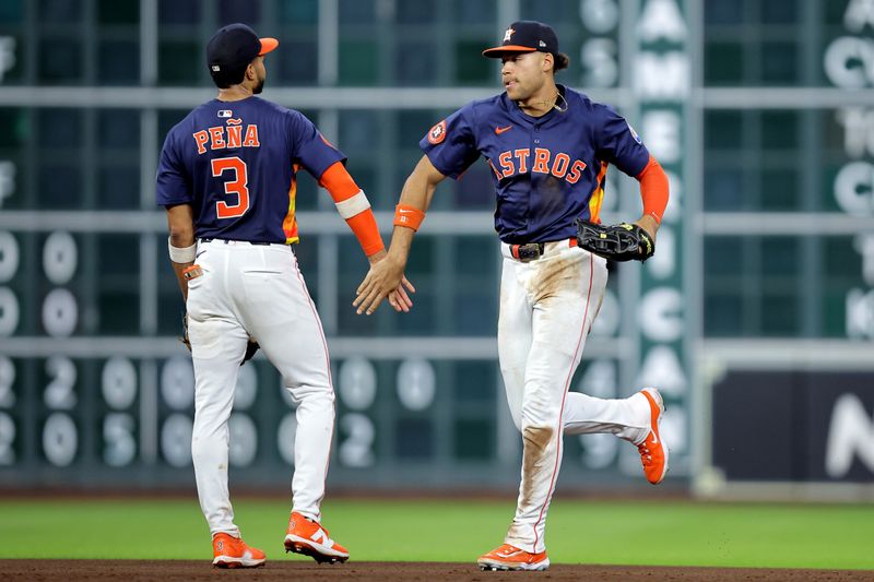 Jun 24, 2025; Houston, Texas, USA; Houston Astros shortstop Jeremy Pena (3) is congratulated by Houston Astros right fielder Cam Smith (11) after the final out against the Philadelphia Phillies during the ninth inning at Daikin Park. Mandatory Credit: Erik Williams-Imagn Images