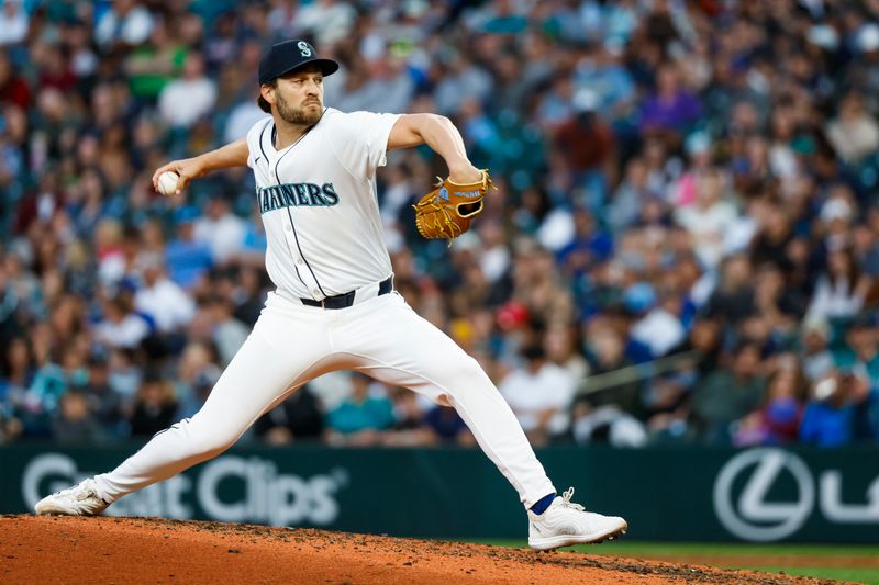 Jul 2, 2024; Seattle, Washington, USA; Seattle Mariners relief pitcher Collin Snider (52) throws against the Baltimore Orioles during the eighth inning at T-Mobile Park. Mandatory Credit: Joe Nicholson-USA TODAY Sports