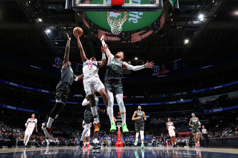 WASHINGTON, DC -? JANUARY 13:  Jordan Poole #13 of the Washington Wizards drives to the basket during the game against the Minnesota Timberwolves on January 13, 2025 at Capital One Arena in Washington, DC. NOTE TO USER: User expressly acknowledges and agrees that, by downloading and or using this Photograph, user is consenting to the terms and conditions of the Getty Images License Agreement. Mandatory Copyright Notice: Copyright 2025 NBAE (Photo by Stephen Gosling/NBAE via Getty Images)