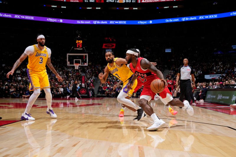 TORONTO, CANADA - NOVEMBER 1: Jamal Shead #23 of the Toronto Raptors handles the ball during the game against the Los Angeles Lakers on November 1, 2024 at the Scotiabank Arena in Toronto, Ontario, Canada.  NOTE TO USER: User expressly acknowledges and agrees that, by downloading and or using this Photograph, user is consenting to the terms and conditions of the Getty Images License Agreement.  Mandatory Copyright Notice: Copyright 2024 NBAE (Photo by Mark Blinch/NBAE via Getty Images)