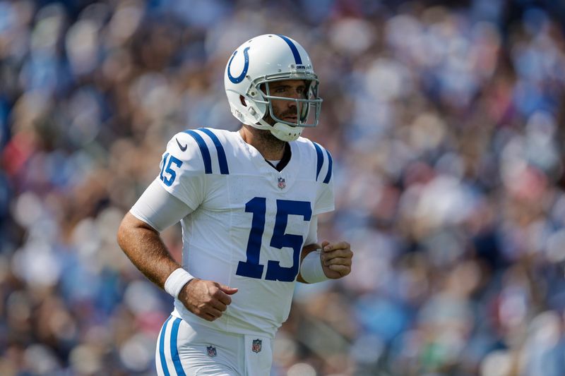 Indianapolis Colts quarterback Joe Flacco (15) runs off the field during the first half of an NFL football game against the Tennessee Titans, Sunday, Oct. 13, 2024, in Nashville, Tenn. (AP Photo/Stew Milne)