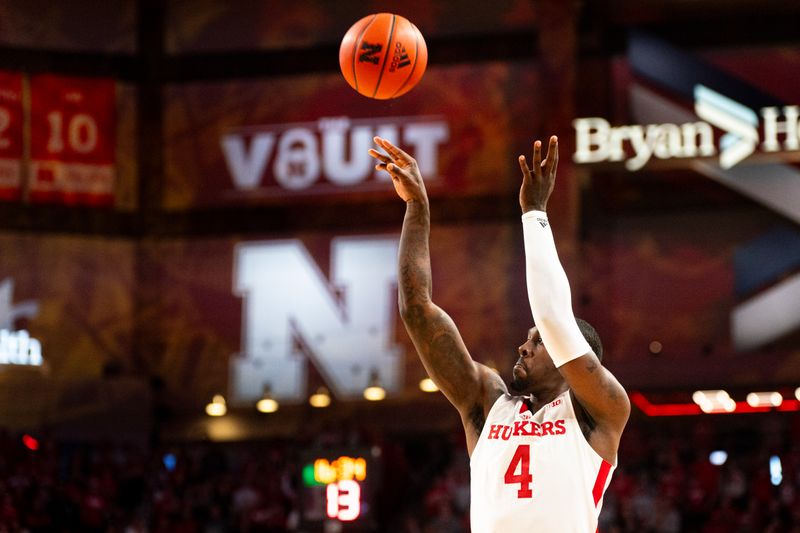 Mar 3, 2024; Lincoln, Nebraska, USA; Nebraska Cornhuskers forward Juwan Gary (4) shoots a 3-point shot against the Rutgers Scarlet Knights during the first half at Pinnacle Bank Arena. Mandatory Credit: Dylan Widger-USA TODAY Sports