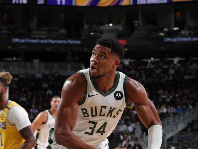 MILWAUKEE, WI - OCTOBER 10: Giannis Antetokounmpo #34 of the Milwaukee Bucks shoots the ball during the game against the Los Angeles Lakers during a preseason game on October 10, 2024 at Fiserv Forum Center in Milwaukee, Wisconsin. NOTE TO USER: User expressly acknowledges and agrees that, by downloading and or using this Photograph, user is consenting to the terms and conditions of the Getty Images License Agreement. Mandatory Copyright Notice: Copyright 2024 NBAE (Photo by Gary Dineen/NBAE via Getty Images).