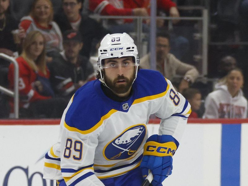 Nov 2, 2024; Detroit, Michigan, USA; Buffalo Sabres right wing Alex Tuch (89) handles the puck during the first period of the game against the Detroit Red Wings at Little Caesars Arena. Mandatory Credit: Brian Bradshaw Sevald-Imagn Images