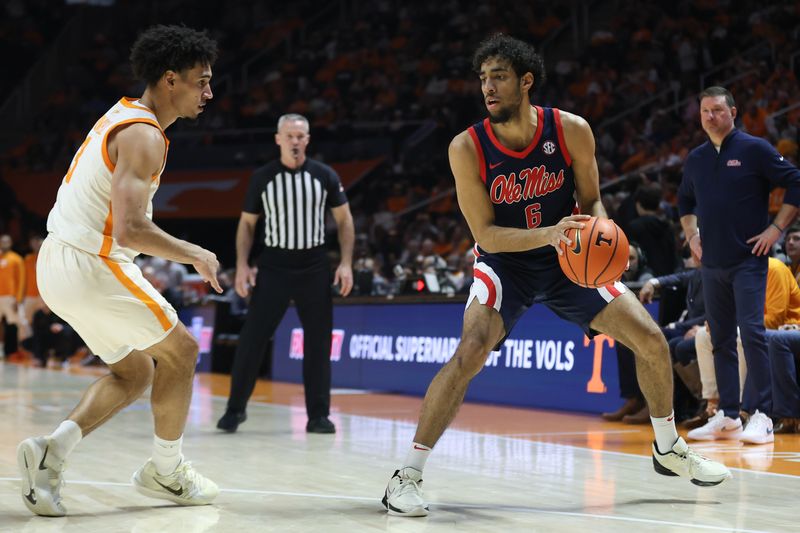 Feb 3, 2026; Knoxville, Tennessee, USA;  Mississippi Rebels guard Ilias Kamardine (6) looks to move the ball against Tennessee Volunteers guard Bishop Boswell (3) during the second half at Thompson-Boling Arena at Food City Center. Mandatory Credit: Randy Sartin-Imagn Images