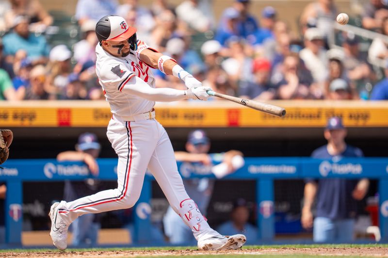 Jun 7, 2025; Minneapolis, Minnesota, USA; Minnesota Twins third base Royce Lewis (23) flies out to end the sixth inning against the Toronto Blue Jays at Target Field. Mandatory Credit: Matt Blewett-Imagn Images