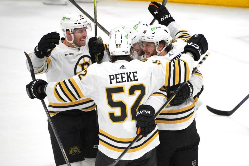 Mar 26, 2024; Sunrise, Florida, USA; The Boston Bruins celebrate the goal of center Pavel Zacha (18) against the Florida Panthers during the third period at Amerant Bank Arena. Mandatory Credit: Jim Rassol-USA TODAY Sports