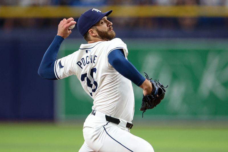 Jul 11, 2024; St. Petersburg, Florida, USA; Tampa Bay Rays pitcher Colin Poche (38) throws a pitch against the New York Yankees in the eighth inning at Tropicana Field. Mandatory Credit: Nathan Ray Seebeck-USA TODAY Sports