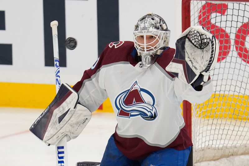 Jan 13, 2024; Toronto, Ontario, CAN; Colorado Avalanche goaltender Alexandar Georgiev (40) goes to make a save during the warm up before a game against the Toronto Maple Leafs at Scotiabank Arena. Mandatory Credit: John E. Sokolowski-USA TODAY Sports