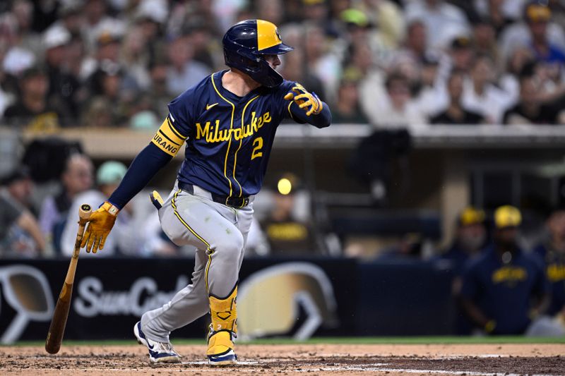 Jun 21, 2024; San Diego, California, USA; Milwaukee Brewers second baseman Brice Turang (2) drives in a run on a fielder’s choice during the fifth inning against the San Diego Padres at Petco Park. Mandatory Credit: Orlando Ramirez-USA TODAY Sports