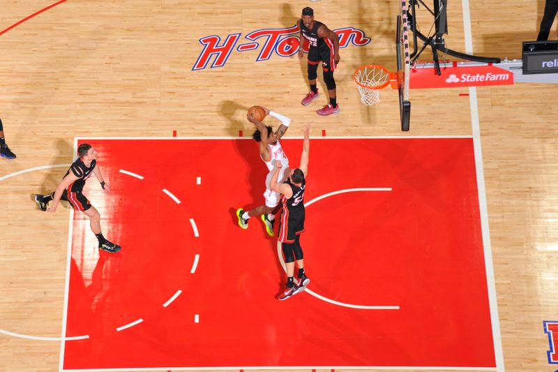 HOUSTON, TX - APRIL 5: Jalen Green #4 of the Houston Rockets drives to the basket during the game against the Miami Heat on April 5, 2024 at the Toyota Center in Houston, Texas. NOTE TO USER: User expressly acknowledges and agrees that, by downloading and or using this photograph, User is consenting to the terms and conditions of the Getty Images License Agreement. Mandatory Copyright Notice: Copyright 2024 NBAE (Photo by Logan Riely/NBAE via Getty Images)