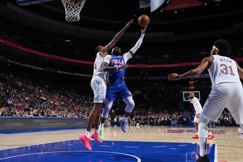 PHILADELPHIA, PA - NOVEMBER 13: Jared McCain #20 of the Philadelphia 76ers drives to the basket during the game against the Cleveland Cavaliers on November 13, 2024 at the Wells Fargo Center in Philadelphia, Pennsylvania NOTE TO USER: User expressly acknowledges and agrees that, by downloading and/or using this Photograph, user is consenting to the terms and conditions of the Getty Images License Agreement. Mandatory Copyright Notice: Copyright 2024 NBAE (Photo by Jesse D. Garrabrant/NBAE via Getty Images)