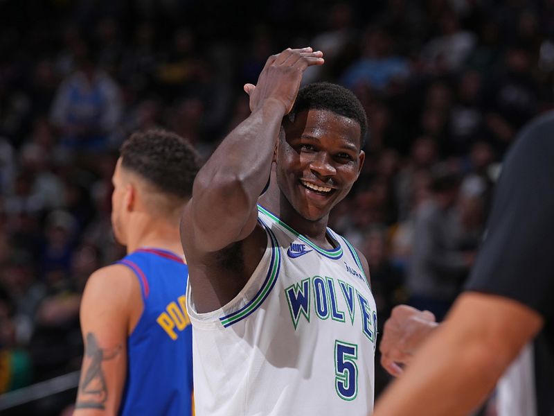 DENVER, CO - MARCH 29: Anthony Edwards #5 of the Minnesota Timberwolves celebrates during the game against the Denver Nuggets on March 29, 2024 at the Ball Arena in Denver, Colorado. NOTE TO USER: User expressly acknowledges and agrees that, by downloading and/or using this Photograph, user is consenting to the terms and conditions of the Getty Images License Agreement. Mandatory Copyright Notice: Copyright 2024 NBAE (Photo by Bart Young/NBAE via Getty Images)