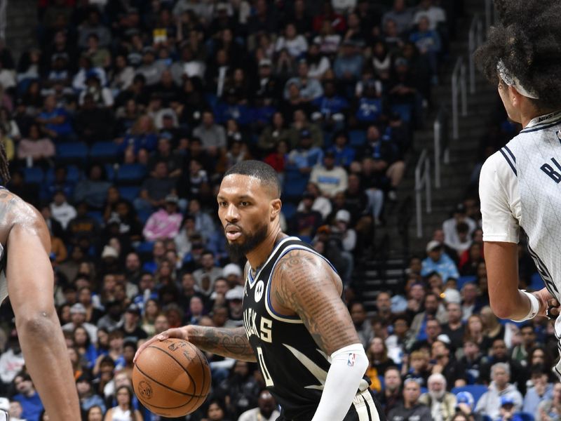 ORLANDO, FL - JANUARY 10: Damian Lillard #0 of the Milwaukee Bucks drives to the basket during the game against the Orlando Magic on January 10, 2025 at Kia Center in Orlando, Florida. NOTE TO USER: User expressly acknowledges and agrees that, by downloading and or using this photograph, User is consenting to the terms and conditions of the Getty Images License Agreement. Mandatory Copyright Notice: Copyright 2025 NBAE (Photo by Fernando Medina/NBAE via Getty Images)