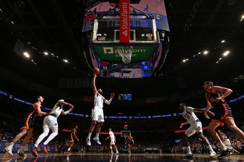 OKLAHOMA CITY, OK - APRIL 14: Markieff Morris #88 of the Dallas Mavericks grabs a rebound during the game against the Oklahoma City Thunder on April 14, 2024 at Paycom Arena in Oklahoma City, Oklahoma. NOTE TO USER: User expressly acknowledges and agrees that, by downloading and or using this photograph, User is consenting to the terms and conditions of the Getty Images License Agreement. Mandatory Copyright Notice: Copyright 2024 NBAE (Photo by Zach Beeker/NBAE via Getty Images)