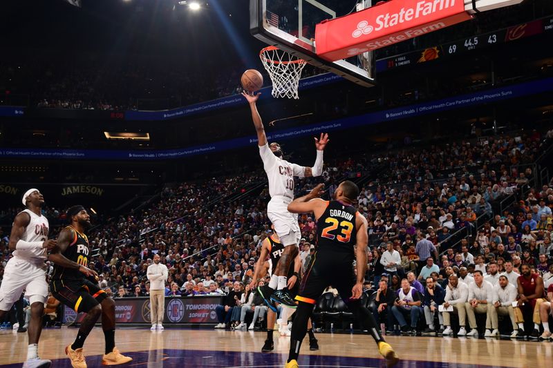 PHOENIX, AZ - APRIL  3: Darius Garland #10 of the Cleveland Cavaliers drives to the basket during the game against the Phoenix Suns on April 3, 2024 at Footprint Center in Phoenix, Arizona. NOTE TO USER: User expressly acknowledges and agrees that, by downloading and or using this photograph, user is consenting to the terms and conditions of the Getty Images License Agreement. Mandatory Copyright Notice: Copyright 2024 NBAE (Photo by Kate Frese/NBAE via Getty Images)