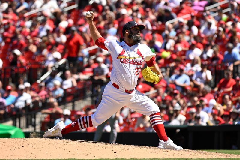 Jun 30, 2024; St. Louis, Missouri, USA; St. Louis Cardinals pitcher Andrew Kittredge (27) throws against the Cincinnati Reds during the seventh inning at Busch Stadium. Mandatory Credit: Jeff Le-USA TODAY Sports