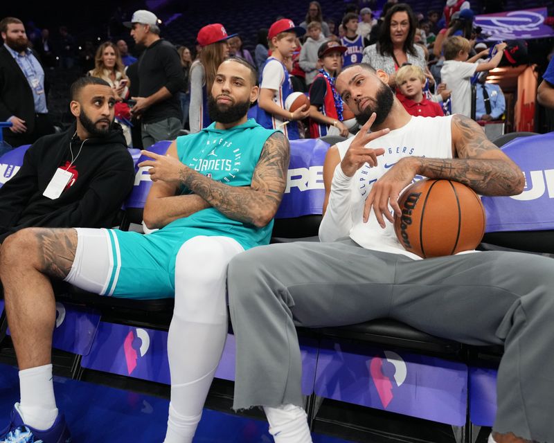 PHILADELPHIA, PA - NOVEMBER 10: Cody Martin #11 of the Charlotte Hornets and Caleb Martin #16 of the Philadelphia 76ers talk before the game on November 10, 2024 at the Wells Fargo Center in Philadelphia, Pennsylvania NOTE TO USER: User expressly acknowledges and agrees that, by downloading and/or using this Photograph, user is consenting to the terms and conditions of the Getty Images License Agreement. Mandatory Copyright Notice: Copyright 2024 NBAE (Photo by Jesse D. Garrabrant/NBAE via Getty Images)