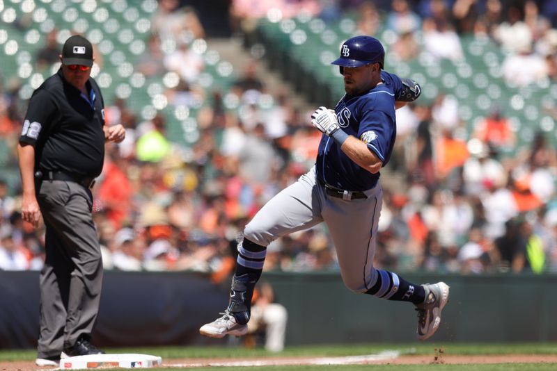 Aug 16, 2023; San Francisco, California, USA; Tampa Bay Rays first baseman Luke Raley (55) hits an inside the park home run during the sixth inning against the San Francisco Giants  at Oracle Park. Mandatory Credit: Sergio Estrada-USA TODAY Sports