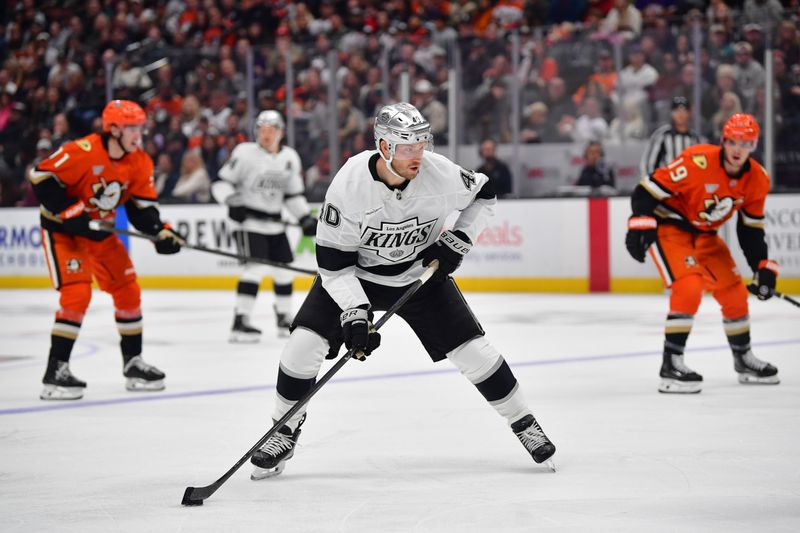 Nov 28, 2025; Anaheim, California, USA; Los Angeles Kings right wing Joel Armia (40) moves the puck against the Anaheim Ducks during the third period at Honda Center. Mandatory Credit: Gary A. Vasquez-Imagn Images