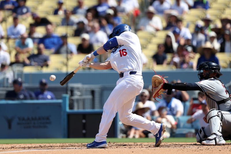 Sep 8, 2024; Los Angeles, California, USA;  Los Angeles Dodgers catcher Will Smith (16) hits an RBI single during the fourth inning against the Cleveland Guardians at Dodger Stadium. Mandatory Credit: Kiyoshi Mio-Imagn Images