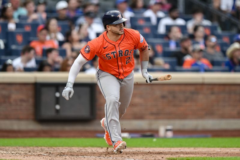 Jun 29, 2024; New York City, New York, USA; Houston Astros catcher Yainer Diaz (21) hits a single against the New York Mets during the ninth inning at Citi Field. Mandatory Credit: John Jones-USA TODAY Sports