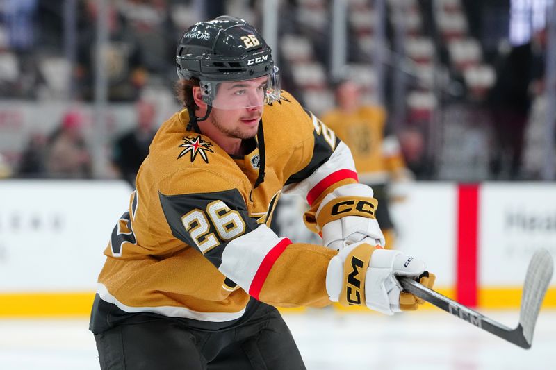 Nov 2, 2024; Las Vegas, Nevada, USA; Vegas Golden Knights right wing Alexander Holtz (26) warms up before a game against the Utah Hockey Club at T-Mobile Arena. Mandatory Credit: Stephen R. Sylvanie-Imagn Images