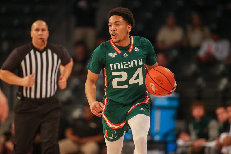 Jan 4, 2023; Atlanta, Georgia, USA; Miami Hurricanes guard Nijel Pack (24) dribbles against the Georgia Tech Yellow Jackets in the first half at McCamish Pavilion. Mandatory Credit: Brett Davis-USA TODAY Sports