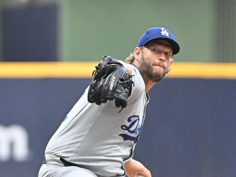 Aug 12, 2024; Milwaukee, Wisconsin, USA; Los Angeles Dodgers pitcher Clayton Kershaw (22) delivers a pitch against the Milwaukee Brewers in the first inningt at American Family Field. Mandatory Credit: Michael McLoone-USA TODAY Sports