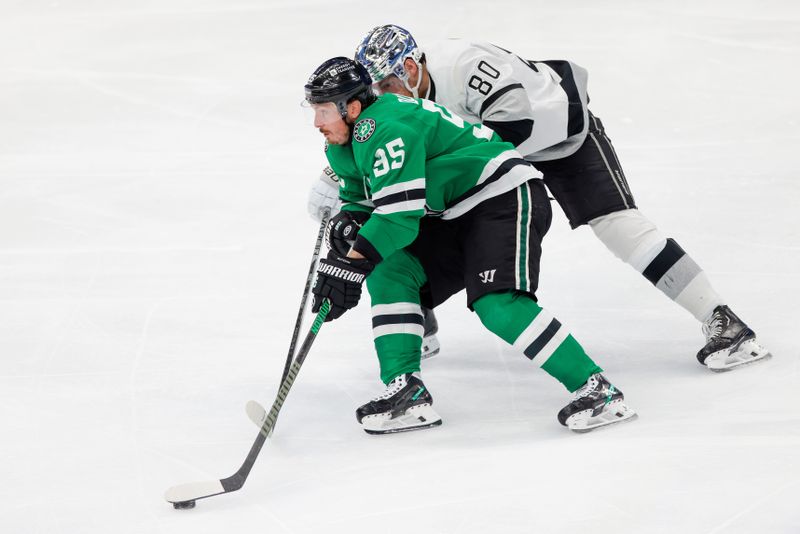 Mar 16, 2024; Dallas, Texas, USA; Dallas Stars center Matt Duchene (95) battles with Los Angeles Kings center Pierre-Luc Dubois (80) during the third period at American Airlines Center. Mandatory Credit: Andrew Dieb-USA TODAY Sports