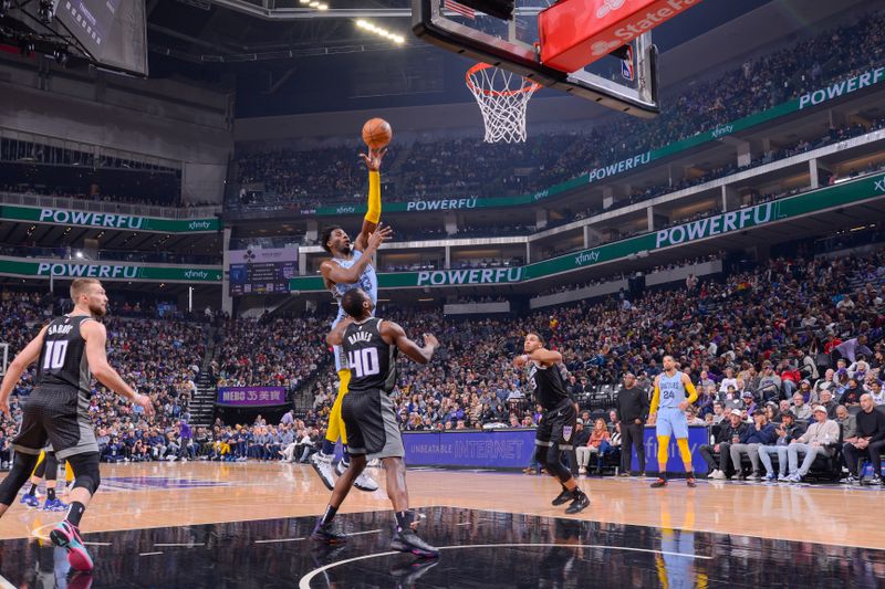 SACRAMENTO, CA - JANUARY 23:  Jaren Jackson Jr. #13 of the Memphis Grizzlies drives to the basket during the game against the Sacramento Kings on January 23, 2023 at Golden 1 Center in Sacramento, California. NOTE TO USER: User expressly acknowledges and agrees that, by downloading and or using this Photograph, user is consenting to the terms and conditions of the Getty Images License Agreement. Mandatory Copyright Notice: Copyright 2023 NBAE (Photo by Rocky Widner/NBAE via Getty Images)