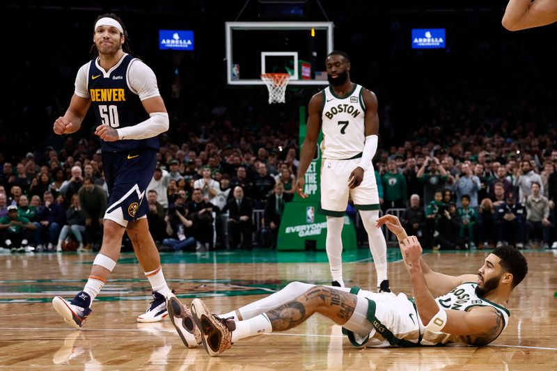 BOSTON, MA - JANUARY 19: Aaron Gordon #50 of the Denver Nuggets begins celebrating after a last second shot by Jayson Tatum #0 of the Boston Celtics did not go in during the second half of the Celtics first home loss of the season at TD Garden on January 19, 2024 in Boston, Massachusetts. NOTE TO USER: User expressly acknowledges and agrees that, by downloading and/or using this Photograph, user is consenting to the terms and conditions of the Getty Images License Agreement. (Photo By Winslow Townson/Getty Images)