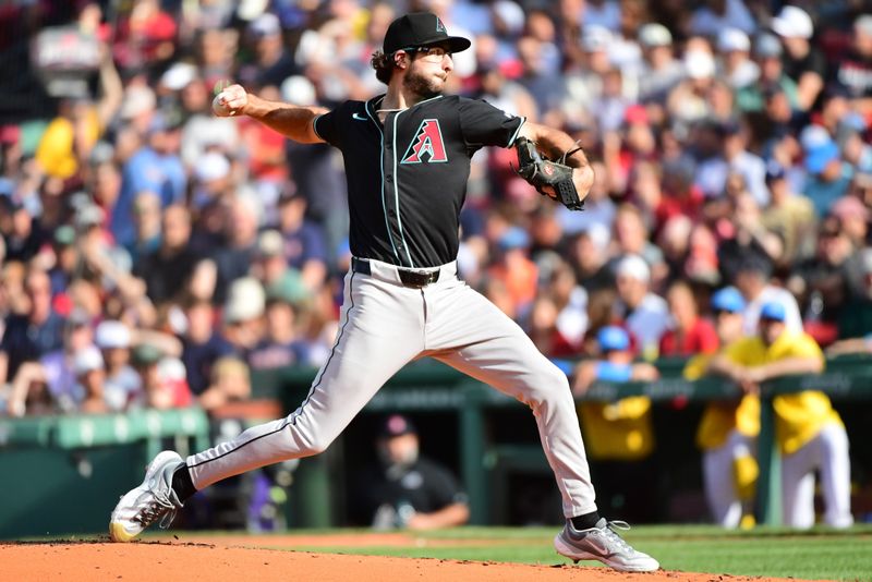 Aug 24, 2024; Boston, Massachusetts, USA;  Arizona Diamondbacks starting pitcher Zac Gallen (23) pitches during the second inning against the Boston Red Sox at Fenway Park. Mandatory Credit: Bob DeChiara-USA TODAY Sports