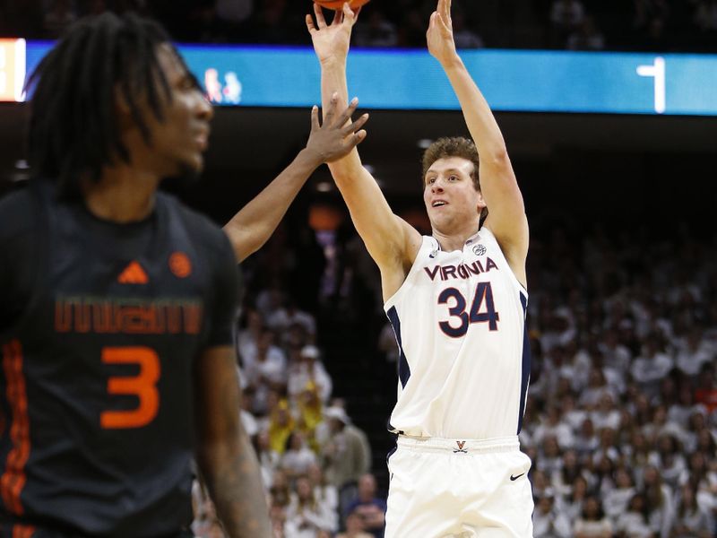 Feb 5, 2024; Charlottesville, Virginia, USA; Virginia Cavaliers forward Jacob Groves (34) shoots the ball against the Miami (Fl) Hurricanes during the second half at John Paul Jones Arena. Mandatory Credit: Amber Searls-USA TODAY Sports