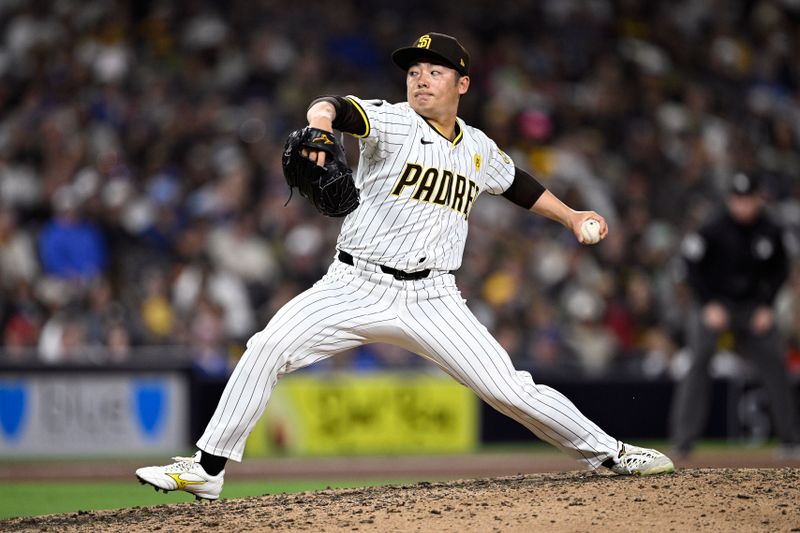Apr 20, 2024; San Diego, California, USA; San Diego Padres relief pitcher Yuki Matsui (1) throws a pitch against the Toronto Blue Jays during the ninth inning at Petco Park. Mandatory Credit: Orlando Ramirez-USA TODAY Sports