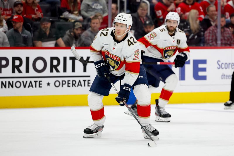 Mar 2, 2024; Detroit, Michigan, USA; Florida Panthers defenseman Gustav Forsling (42) skates with the puck in the third period against the Detroit Red Wings at Little Caesars Arena. Mandatory Credit: Rick Osentoski-USA TODAY Sports