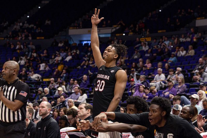 Feb 18, 2023; Baton Rouge, Louisiana, USA; South Carolina Gamecocks forward Daniel Hankins-Sanford (30) reacts to a three point basket against the LSU Tigers during the second half at Pete Maravich Assembly Center. Mandatory Credit: Stephen Lew-USA TODAY Sports