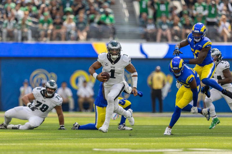 Philadelphia Eagles quarterback Jalen Hurts (1) runs the ball against the Los Angeles Rams in an NFL football game, Sunday, Oct. 8, 2023, in Inglewood, Calif. Eagles won 23-14. (AP Photo/Jeff Lewis)