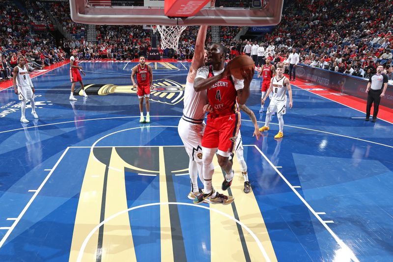 NEW ORLEANS, LA - NOVEMBER 15: Javonte Green #4 of the New Orleans Pelicans drives to the basket during the game against the Denver Nuggets during the Emirates NBA Cup game on November 15, 2024 at the Smoothie King Center in New Orleans, Louisiana. NOTE TO USER: User expressly acknowledges and agrees that, by downloading and or using this Photograph, user is consenting to the terms and conditions of the Getty Images License Agreement. Mandatory Copyright Notice: Copyright 2024 NBAE (Photo by Layne Murdoch Jr./NBAE via Getty Images)