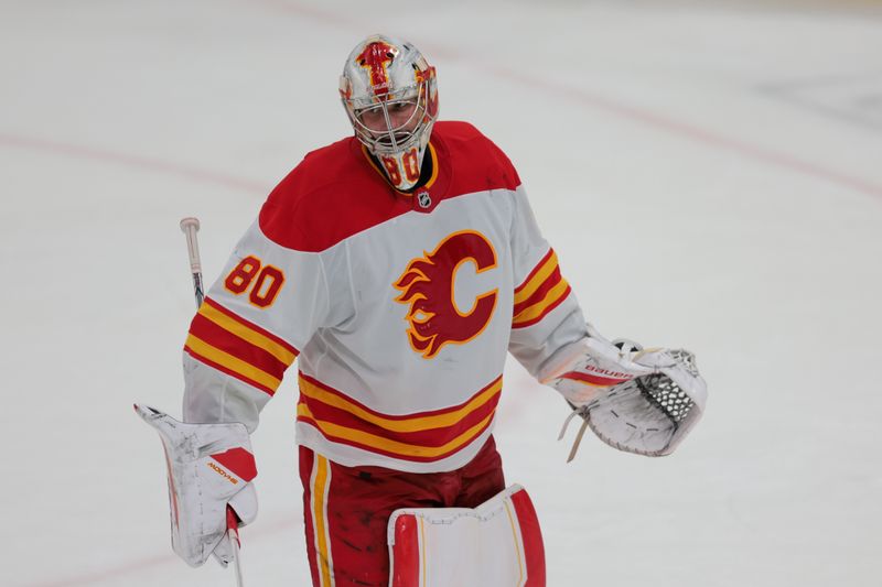 Mar 1, 2025; Sunrise, Florida, USA; Calgary Flames goaltender Dan Vladar (80) reacts against the Florida Panthers during the second period at Amerant Bank Arena. Mandatory Credit: Sam Navarro-Imagn Images