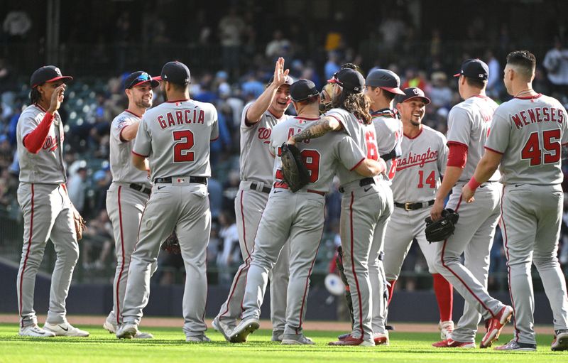 Sep 17, 2023; Milwaukee, Wisconsin, USA;  Washington Nationals celebrate a 2-1 extra innings win over the Milwaukee Brewers at American Family Field. Mandatory Credit: Michael McLoone-USA TODAY Sports