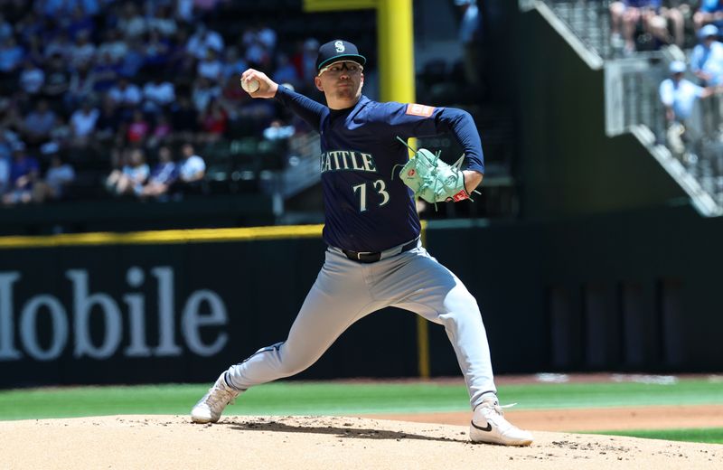 May 4, 2025; Arlington, Texas, USA;  Seattle Mariners starting pitcher Logan Evans (73) throws during the first inning against the Texas Rangers at Globe Life Field. Mandatory Credit: Kevin Jairaj-Imagn Images