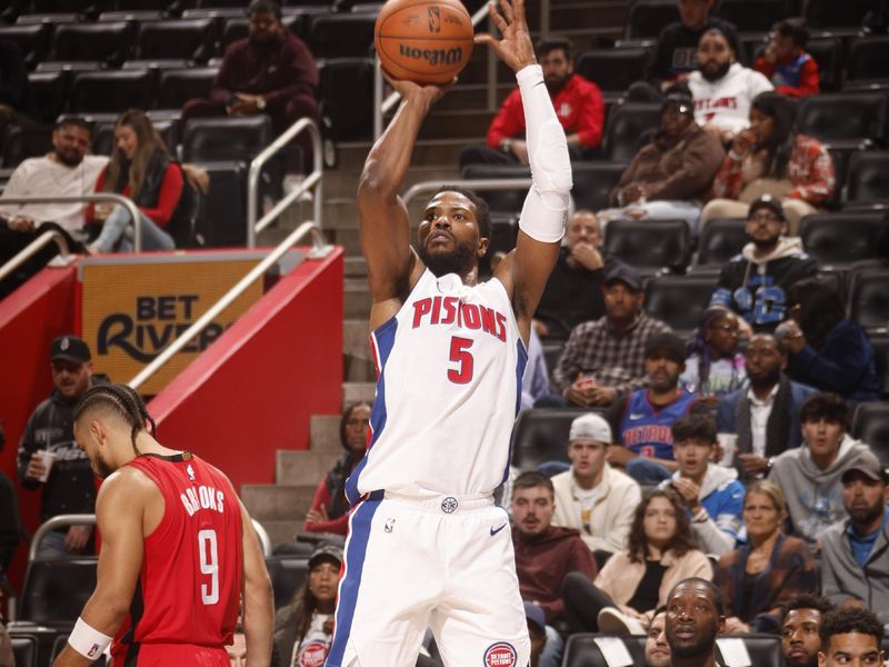 DETROIT, MI - NOVEMBER 10: Malik Beasley #5 of the Detroit Pistons shoots a three point basket during the game against the Houston Rockets on November 10, 2024 at Little Caesars Arena in Detroit, Michigan. NOTE TO USER: User expressly acknowledges and agrees that, by downloading and/or using this photograph, User is consenting to the terms and conditions of the Getty Images License Agreement. Mandatory Copyright Notice: Copyright 2024 NBAE (Photo by Brian Sevald/NBAE via Getty Images)