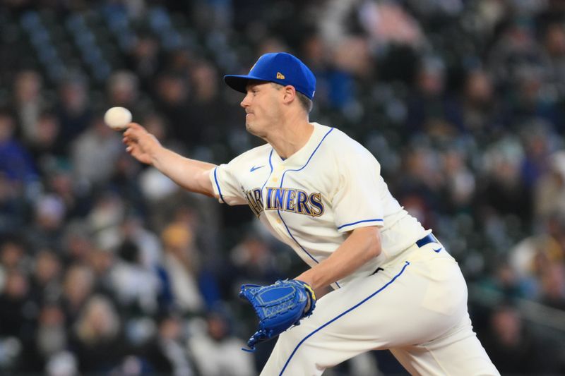 Apr 16, 2023; Seattle, Washington, USA; Seattle Mariners relief pitcher Paul Sewald (37) pitches to the Colorado Rockies during the ninth inning at T-Mobile Park. Mandatory Credit: Steven Bisig-USA TODAY Sports