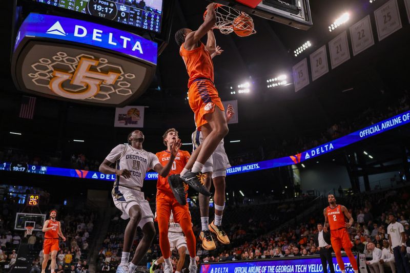 Jan 24, 2026; Atlanta, Georgia, USA; Clemson Tigers forward RJ Godfrey (0) dunks against the Georgia Tech Yellow Jackets in the first half at McCamish Pavilion. Mandatory Credit: Brett Davis-Imagn Images