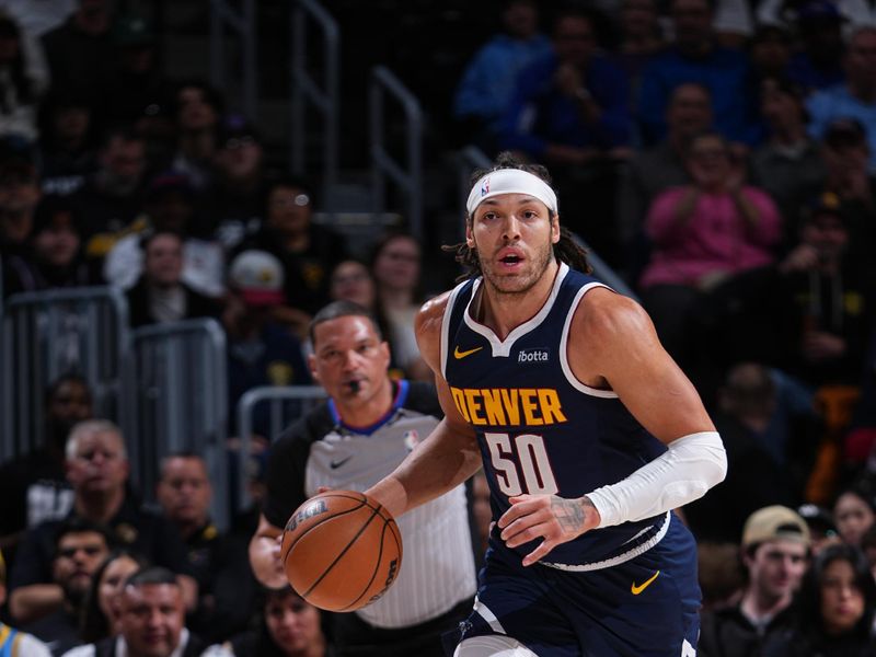 DENVER, CO - FEBRUARY 14: Aaron Gordon #50 of the Denver Nuggets dribbles the ball during the game against the Sacramento Kings on February 14, 2024 at the Ball Arena in Denver, Colorado. NOTE TO USER: User expressly acknowledges and agrees that, by downloading and/or using this Photograph, user is consenting to the terms and conditions of the Getty Images License Agreement. Mandatory Copyright Notice: Copyright 2024 NBAE (Photo by Garrett Ellwood/NBAE via Getty Images)