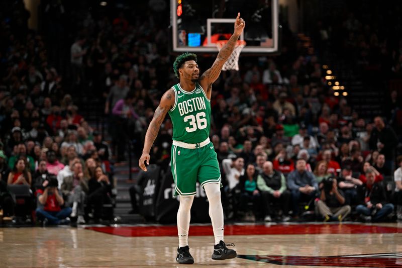 PORTLAND, OREGON - MARCH 17: Marcus Smart #36 of the Boston Celtics gestures during the third quarter against the Portland Trail Blazers at the Moda Center on March 17, 2023 in Portland, Oregon. The Boston Celtics won 126-112. NOTE TO USER: User expressly acknowledges and agrees that, by downloading and or using this photograph, User is consenting to the terms and conditions of the Getty Images License Agreement. (Photo by Alika Jenner/Getty Images)